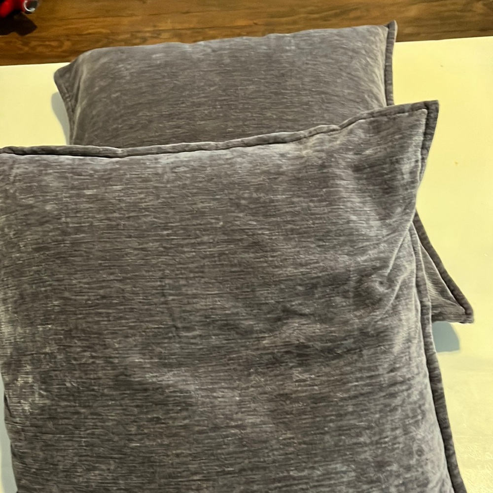 Zippered throw pillows. Gray